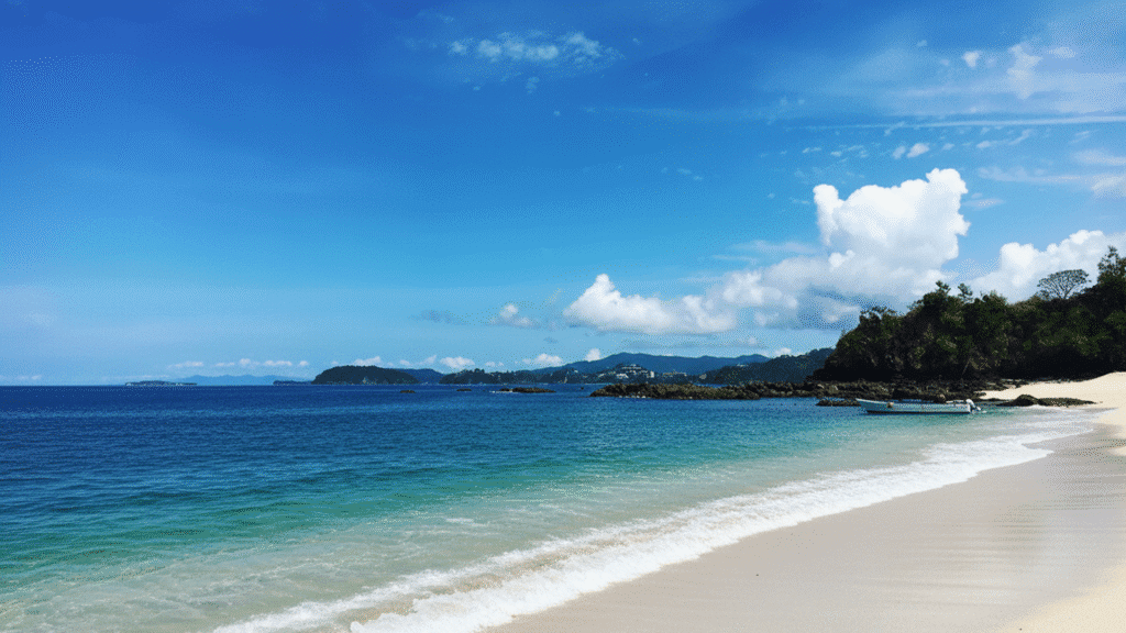 Crystal clear water and shell sand of Playa Conchal Costa Rica, ideal for snorkeling and honeymoon trips